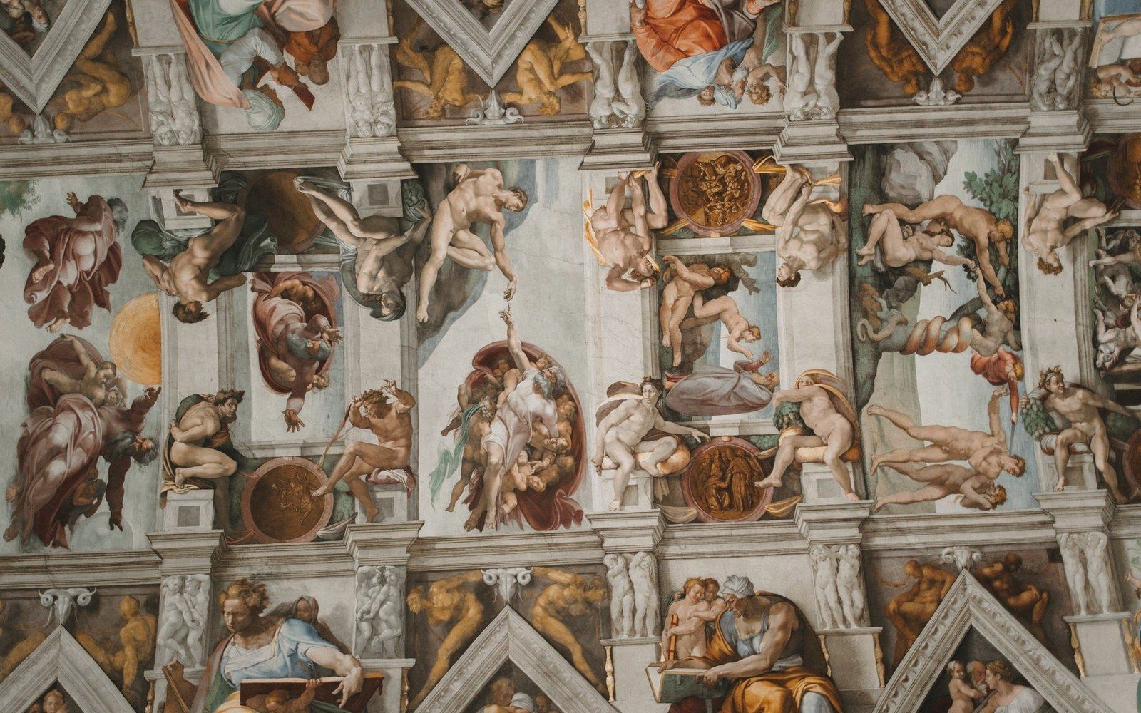 Frescoed ceiling panels depicting biblical scenes and nude figures amid painted architectural framing